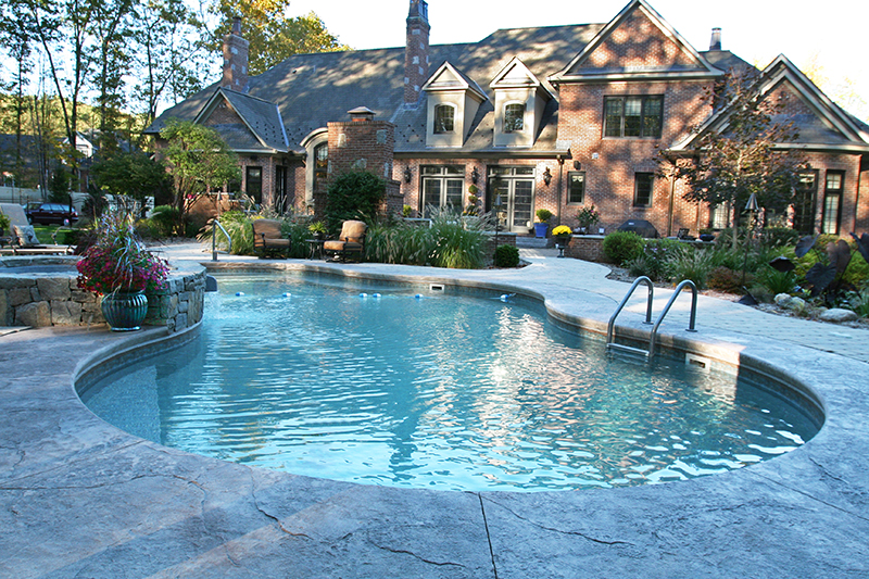 Swimming pool and stamped concrete project example 182